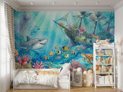 Watercolour Shipwreck and Underwater Treasure Wall Mural – child’s bedroom with a bed and bookcase mock-up