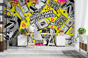 Modern room with a vibrant wall mural featuring gaming-themed graphics.