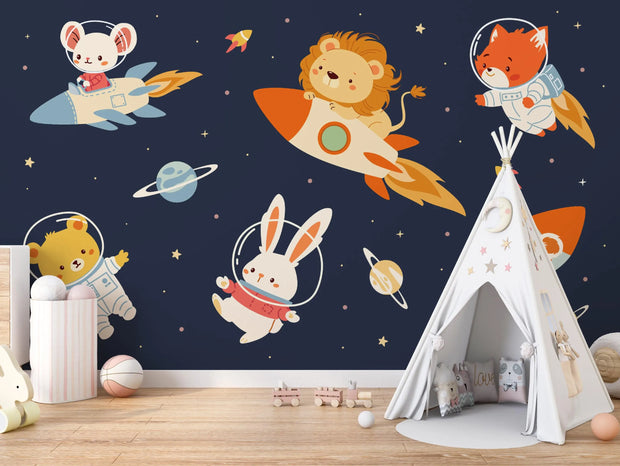 Children's room with space-themed wall mural featuring animals in astronaut outfits.