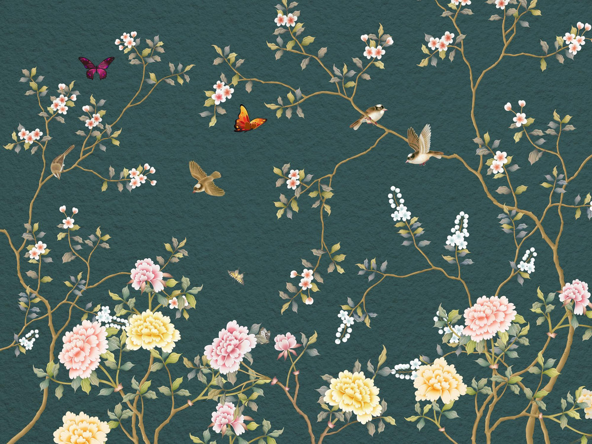 A repeating floral and bird pattern on a dark teal background, featuring pink and cream blossoms, yellow flowers, green leaves, butterflies, and small birds on gold-toned branches.
