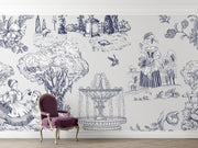 A white wall covered in a detailed blue toile-style mural print featuring classical figures, trees, a fountain, and floral motifs, with a purple upholstered armchair placed in front.