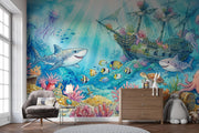 Watercolour Shipwreck and Underwater Treasure Wall Mural – nursery with an armchair and chest of drawers mock-up
