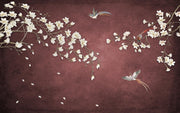 Decorative design of white flowers and birds on a brown background