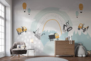 Children's room with construction-themed wall mural, furniture, and toys.