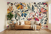 Blush and Mustard Abstract Floral Wall Mural – living room with a tan sofa mock-up
