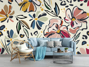 Blush and Mustard Abstract Floral Wall Mural – living room with a blue sofa mock-up