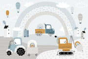 Illustration of construction vehicles and a rainbow in a snowy landscape.