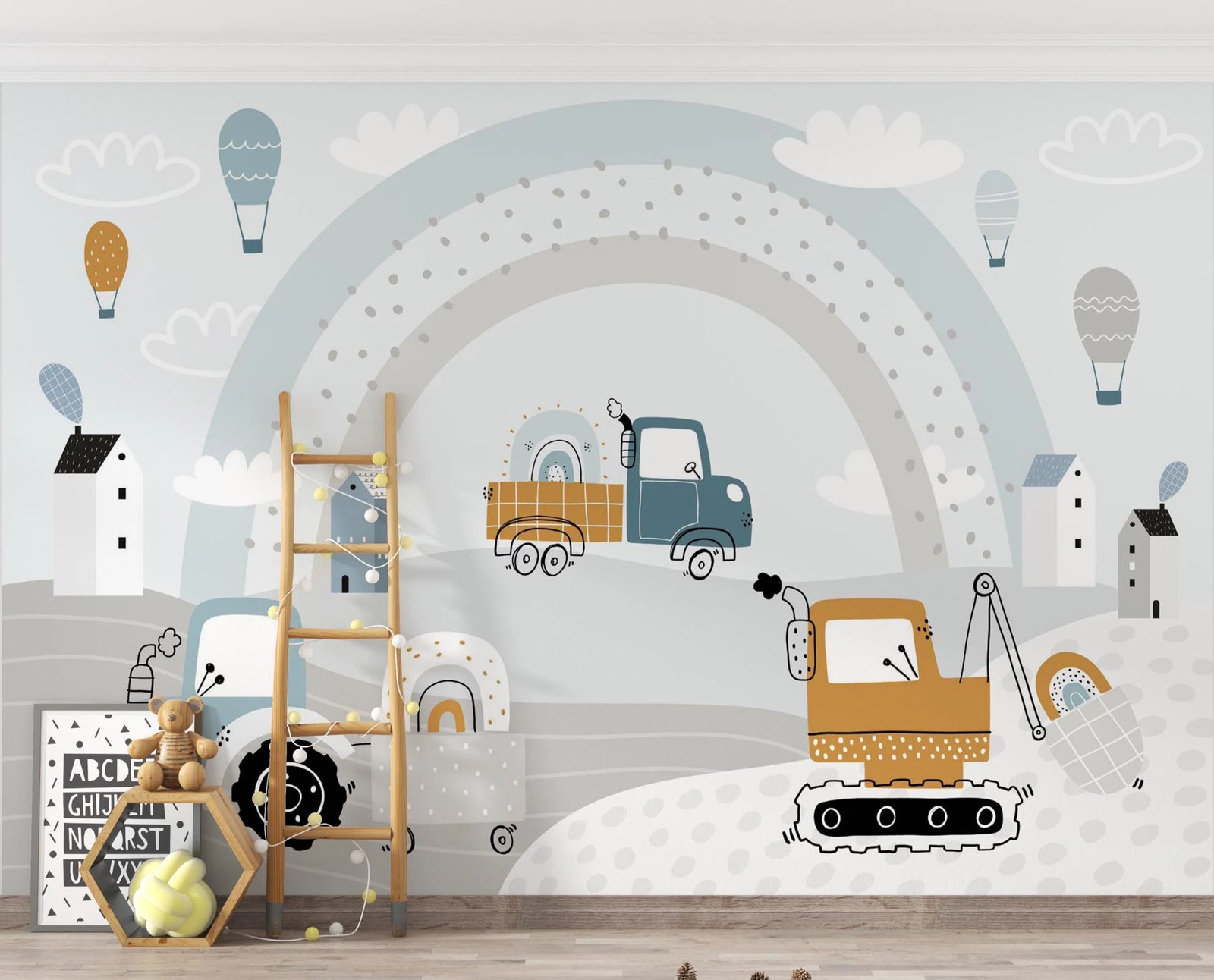 Children's room with wall mural featuring a truck, excavator, and rainbow.