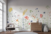 Children's room with floral wall decals and wooden furniture.