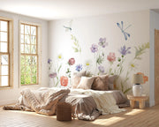 Bedroom with floral wall mural and natural light