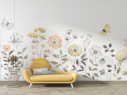 Yellow sofa in front of floral wallpaper with butterflies