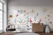 Room interior with floral wall mural, furniture, and decor items.