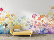 Yellow sofa in front of a colorful floral wall mural.