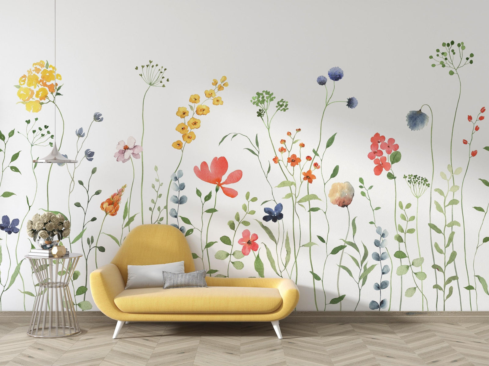 Yellow sofa in front of a wall with colorful floral decals