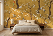 Golden Japanese Blossom Garden Wall Mural behind a bed in a bedroom mockup.