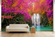 Pink forest waterfall wall mural behind an ivory sofa in a living room mockup