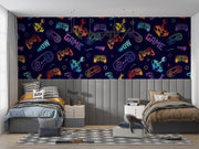 Bedroom with colorful game controller patterned wall art above two beds.