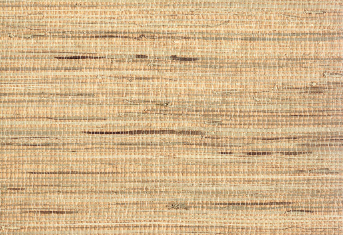 A close-up texture shot of a woven natural fiber material, showing horizontal strands in a light tan and beige color.