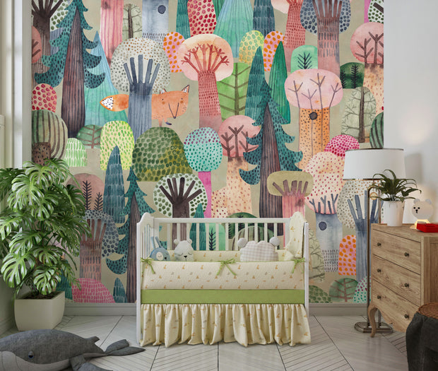 Children's room with colorful forest mural, crib, and decor elements.
