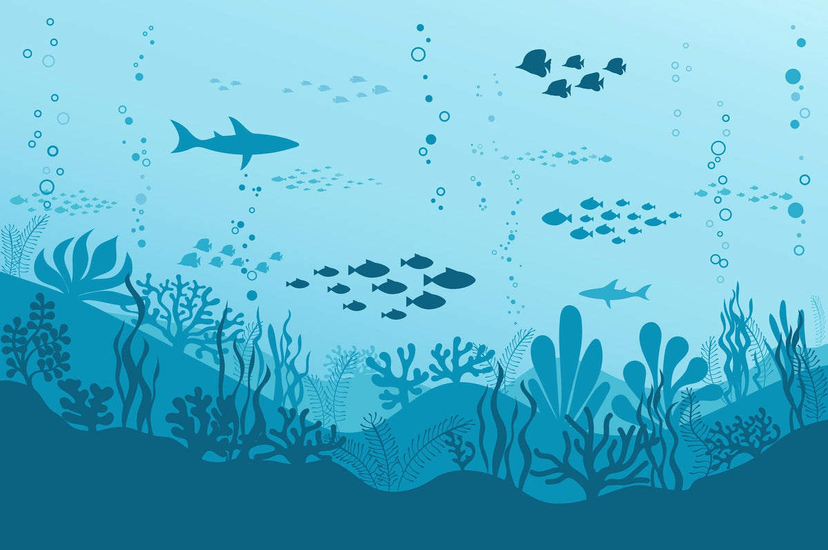 Underwater-themed wall mural featuring silhouettes of sharks, fish, and coral reefs in varying shades of blue, perfect for a calming and playful kids’ room.