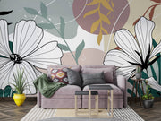 Living room with a gray sofa, decorative pillows, and a large floral mural on the wall.