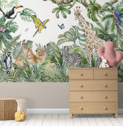 Safari adventure wall mural featuring watercolor jungle animals such as lions, giraffes, zebras, and parrots, styled in a cozy nursery.