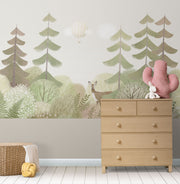 Soft pastel woodland wall mural with trees, a deer, and a dreamy forest landscape for nurseries and kids' rooms.