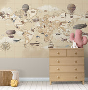 Vintage-style children's world map wall mural with hot air balloons and animals, styled in neutral nursery.