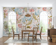 Pastel floral wall mural featuring hand-drawn flowers in pink, blue, and green tones, decorating a dinning room.