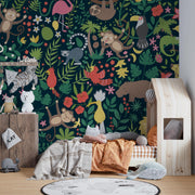 Children's room with colorful jungle-themed wallpaper, wooden bed, and toys.