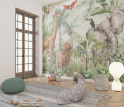 Tropical safari wall mural with exotic animals, including an elephant, giraffe, lion, toucan, and parrot, surrounded by lush tropical leaves and greenery – perfect for kid's rooms and nature-inspired interiors.