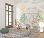 Pastel dinosaur wall mural with soft watercolor-style dinosaurs, a cozy stone cave, lush greenery, and a glowing sun, perfect for nurseries and playrooms.