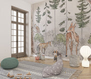 A charming woodland wall mural featuring a deer, fox, owl, and lush greenery surrounded by tall trees. Perfect for kid's rooms or nature-themed nurseries.