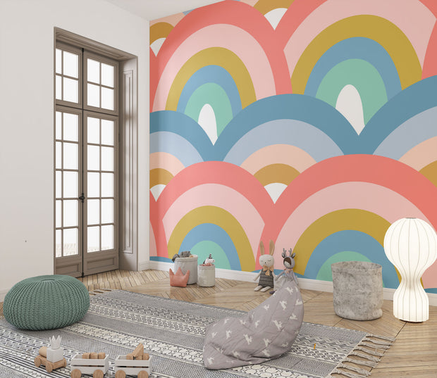 Colorful retro rainbow mural in a kids playroom with toys, and playful decor.