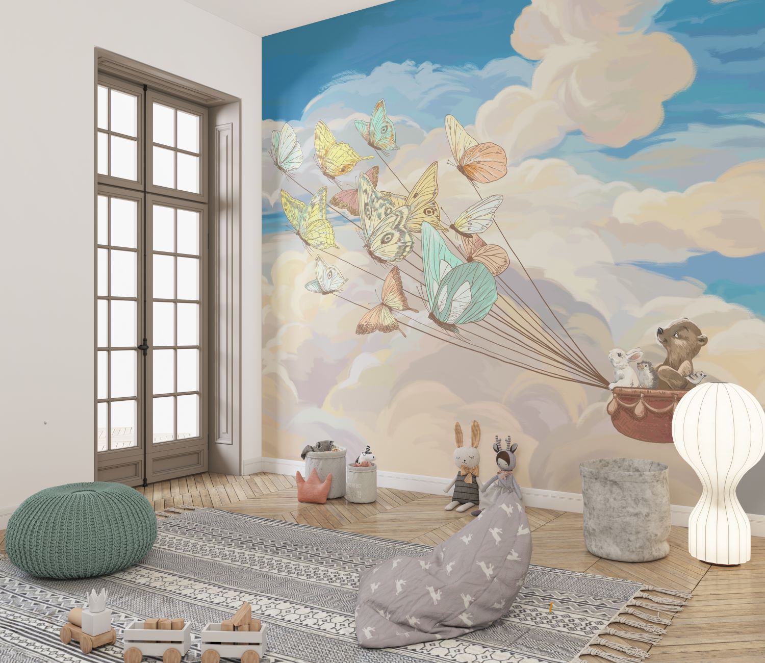 A children's room with a whimsical wall mural showcasing butterflies carrying woodland animals across a cloud-filled sky. The room features soft furnishings, wooden toys, and cozy decor elements.