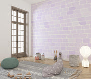 Lavender brick-patterned wall mural with soft pastel tones, decorating a kid's playroom.