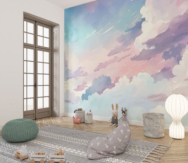 Watercolor cloud wall mural in soft pastel hues of pink, blue, and lavender, creating a dreamy sky effect for kids' rooms and nurseries.