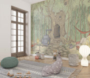Enchanted forest treehouse wall mural featuring a whimsical woodland scene with rustic furniture, cozy decor, and fairy tale charm, perfect for a kids' room.