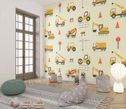 Excavators and dumpers wall mural featuring yellow trucks, cranes, diggers, and traffic cones on a light background, perfect for a boy's bedroom.