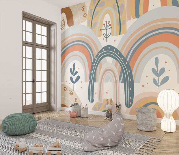 Boho-style kids wall mural with hand-drawn earthy rainbows, abstract florals, and neutral tones in a modern children's playroom.