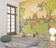 Colorful dinosaur wall mural with smiling dinosaurs, erupting volcanoes, and a sunny prehistoric landscape for kids' rooms and nurseries.