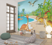 Colorful dinosaur adventure wall mural featuring friendly prehistoric dinosaurs, tropical landscapes, and a bright blue sky, perfect for kid's bedrooms and playrooms.