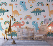 Playful dinosaur-themed wall mural with colorful cartoon dinosaurs, rainbows and flowers; decorating a cozy child’s bedroom .
