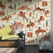 Wild West cowboy wall mural featuring galloping horses, cowboys, cacti, and Western landscapes in a vintage-style wallpaper design.