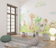 Safari Playground wall mural with watercolor giraffe, zebra, lion, and jungle leaves in a baby nursery or kid's  
playroom.