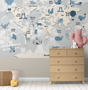 Children’s world map wall mural with cute animals, ocean creatures, and pastel sky background – perfect for kid's rooms and nurseries.