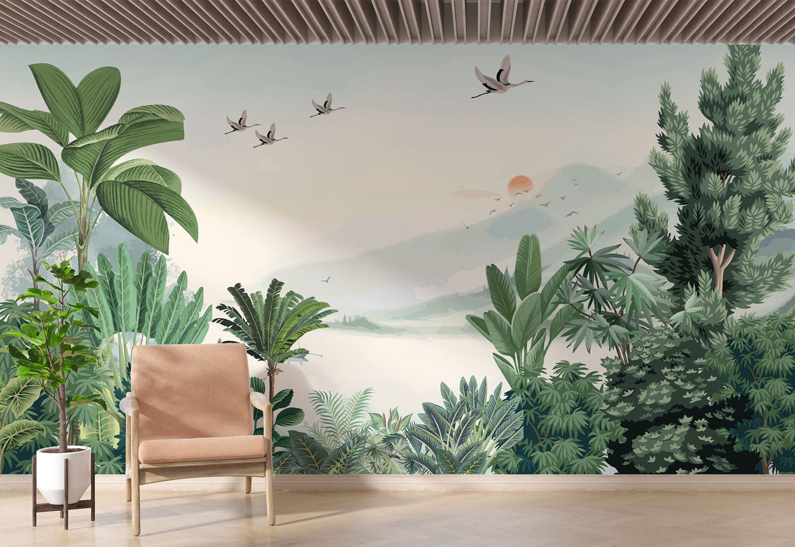 Scenic jungle wall mural with green tropical leaves, misty mountains, and flying cranes against a soft sunrise backdrop.