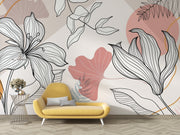 Yellow sofa in front of a wall with floral and abstract designs