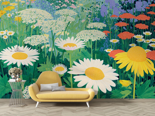 Yellow sofa in front of a wall mural with colorful flowers
