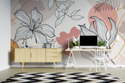 Modern office space with a decorative floral wall mural and stylish furniture.